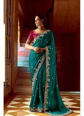 Complements For Your Ravishing Ethnic Look Is This Dazzle In Our Party Wear Fancy Saree,  Vibrant Colors, Luxurious Fabrics, And Bold Designs. Unleash Your Inner Diva And Shine Which Will Reflect The Charm Of High-End Fashion.