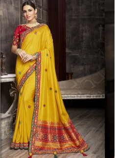 Attractive Banarasi Border Saree With Contrast Heavy Work Blouse Piece