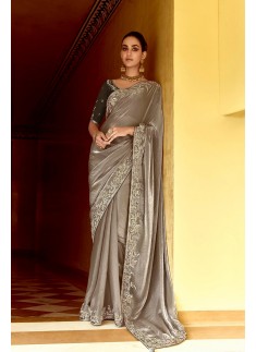 Complements For Your Ravishing Ethnic Look Is This Dazzle In Our Party Wear Fancy Saree,  Vibrant Colors, Luxurious Fabrics, And Bold Designs. Unleash Your Inner Diva And Shine Which Will Reflect The Charm Of High-End Fashion.