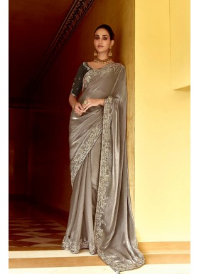 Complements For Your Ravishing Ethnic Look Is This Dazzle In Our Party Wear Fancy Saree,  Vibrant Colors, Luxurious Fabrics, And Bold Designs. Unleash Your Inner Diva And Shine Which Will Reflect The Charm Of High-End Fashion.