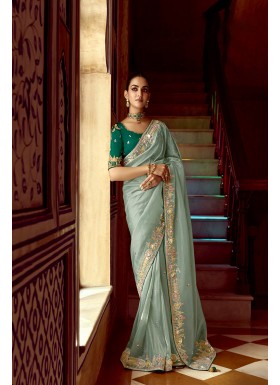 Complements For Your Ravishing Ethnic Look Is This Dazzle In Our Party Wear Fancy Saree,  Vibrant Colors, Luxurious Fabrics, And Bold Designs. Unleash Your Inner Diva And Shine Which Will Reflect The Charm Of High-End Fashion.