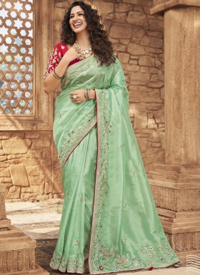 Decent Look Organza Saree With Contrast Heavy Work Blouse Piece