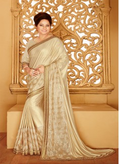 Designer saree with zari work and beige color