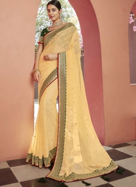 Gorgeous Organza Fabric Saree With Contrast Border And Heavy Blouse Piece