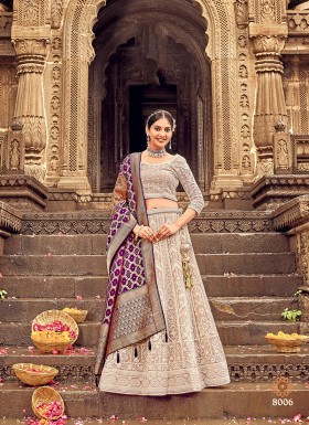 Savory Cream Lucknowi Work Georgette A Line Lehenga Choli