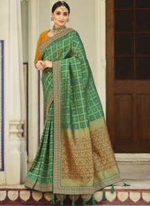 Stunning Banarasi Silk Fabric Saree With ontrast Heavy Work Blouse