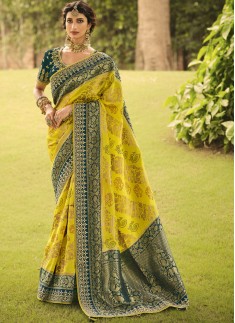 Stunning Banarasi Silk Fabric Saree With ontrast Heavy Work Blouse Piece