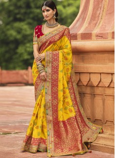 Stunning Banarasi Silk Fabric Saree With ontrast Heavy Work Blouse Piece