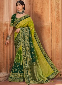 Stunning Banarasi Silk Fabric Saree With ontrast Heavy Work Blouse Piece