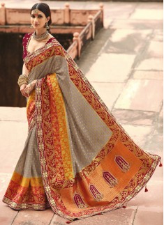Stunning Banarasi Silk Fabric Saree With ontrast Heavy Work Blouse Piece