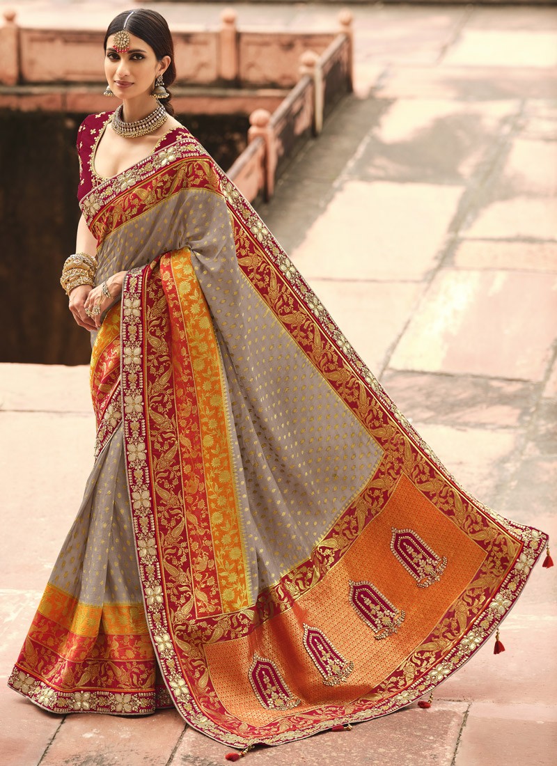 Stunning Banarasi Silk Fabric Saree With ontrast Heavy Work Blouse