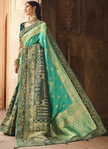 Stunning Banarasi Silk Fabric Saree With ontrast Heavy Work Blouse Piece