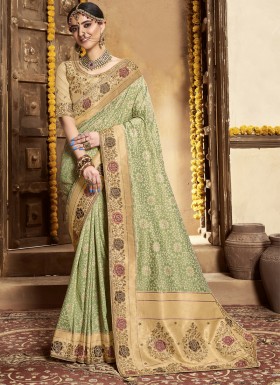 Stunning Banarasi Silk Material Saree With Heavy Work Blouse Piece