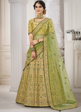 Traditional Silk Fabric Lehenga Choli With Decent Work And Net Dupatta