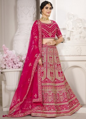 Traditional Silk Fabric Lehenga Choli With Decent Work And Net Dupatta