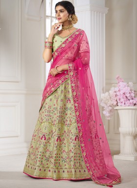 Traditional Silk Fabric Lehenga Choli With Decent Work And Net Dupatta